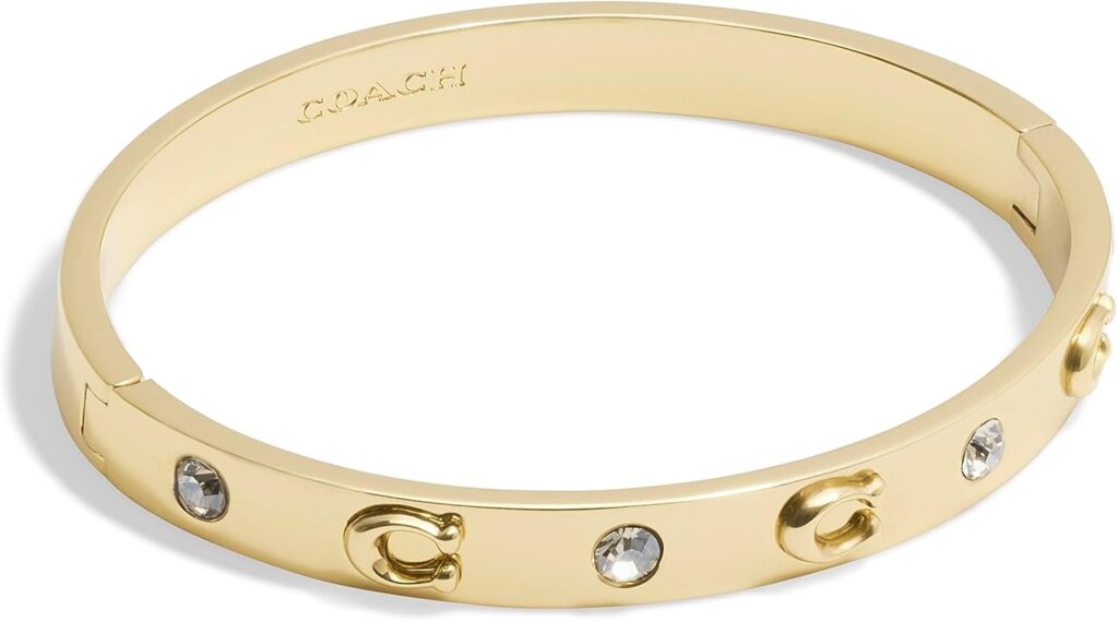 Coach women's signature c logo hinged bangle bracelet illustration